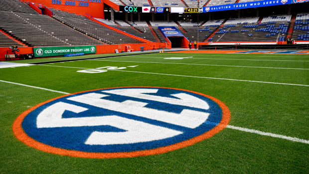 The SEC logo in orange and blue colors is painted on the field before the game between the Florida Gators and Arkansas Razorbacks at Steve Spurrier Field at Ben Hill Griffin Stadium in Gainesville, FL on Saturday, November 4, 2023. [Matt Pendleton/Gainesville Sun]